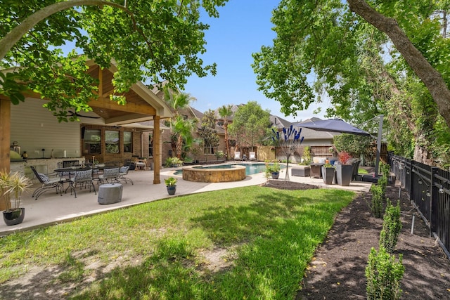 15730 Hunters Lake Way, Houston, TX 77044 - view of yard with an in-ground hot tub, outdoor lounge area, and a patio