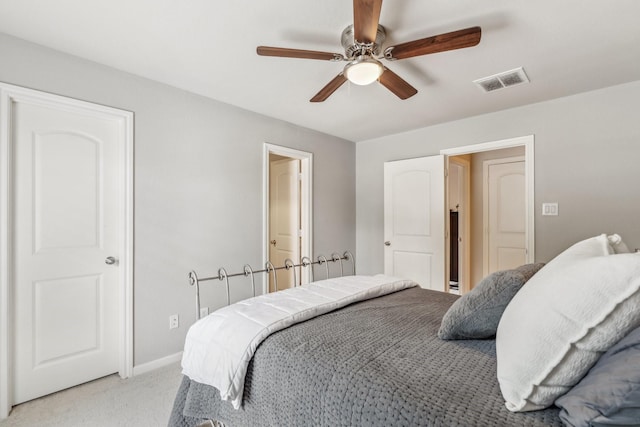 15730 Hunters Lake Way, Houston, TX 77044 - bedroom with light colored carpet, baseboards, and ceiling fan