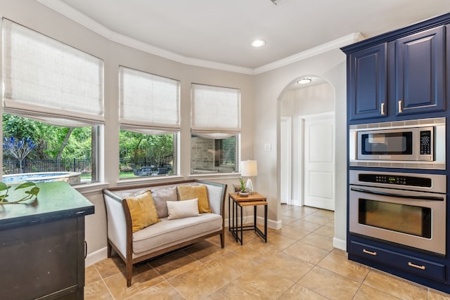 15730 Hunters Lake Way, Houston, TX 77044 - living area with arched walkways, ornamental molding, baseboards, and recessed lighting