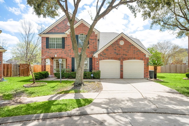 3815 Shadow Knoll Ct, Houston, TX 77082 - view of front of house featuring brick siding, an attached garage, driveway, and a gate