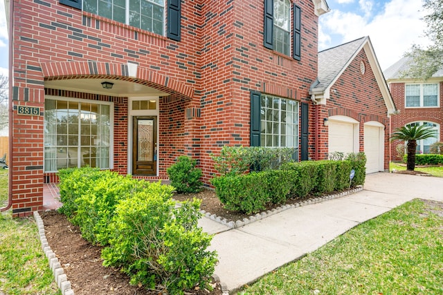 3815 Shadow Knoll Ct, Houston, TX 77082 - view of exterior entry with brick siding and concrete driveway