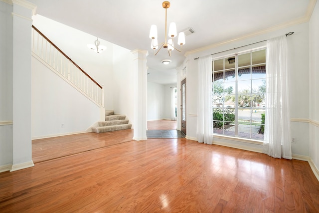 3815 Shadow Knoll Ct, Houston, TX 77082 - unfurnished living room with a chandelier, stairs, wood finished floors, baseboards, and ornamental molding