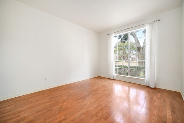 3815 Shadow Knoll Ct, Houston, TX 77082 - spare room featuring light wood-style flooring and baseboards