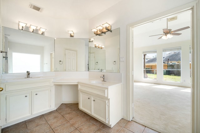 3815 Shadow Knoll Ct, Houston, TX 77082 - bathroom featuring two vanities, tile patterned floors, and ceiling fan