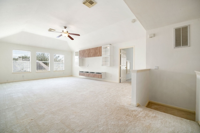 3815 Shadow Knoll Ct, Houston, TX 77082 - unfurnished living room with ceiling fan, light colored carpet, vaulted ceiling, baseboards, and radiator