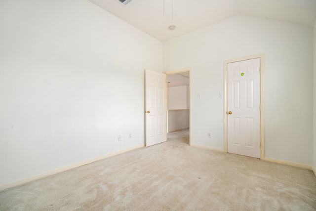 3815 Shadow Knoll Ct, Houston, TX 77082 - unfurnished bedroom featuring vaulted ceiling, carpet flooring, and baseboards