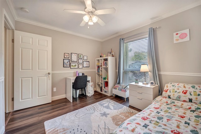 bedroom with dark wood finished floors, ornamental molding, ceiling fan, and baseboards