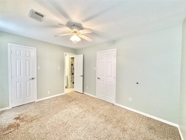 10614 Gold Point Dr, Houston, TX 77064 - unfurnished bedroom with light colored carpet, baseboards, and a ceiling fan
