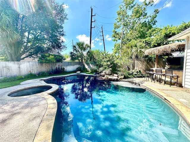 10614 Gold Point Dr, Houston, TX 77064 - view of pool with a fenced backyard, a patio area, and a pool with connected hot tub