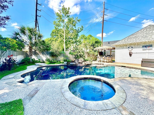 10614 Gold Point Dr, Houston, TX 77064 - view of pool featuring an in-ground hot tub, a fenced backyard, and a patio