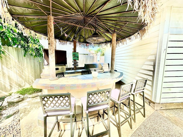 10614 Gold Point Dr, Houston, TX 77064 - view of patio with fence, a grill, and area for grilling