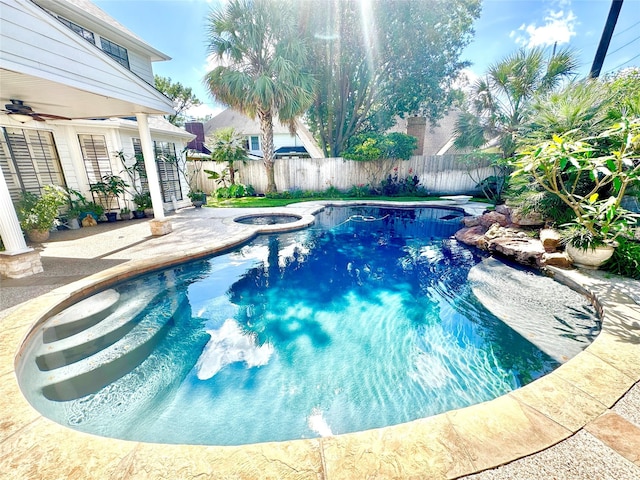 10614 Gold Point Dr, Houston, TX 77064 - view of pool with ceiling fan, a fenced backyard, a patio, and a pool with connected hot tub