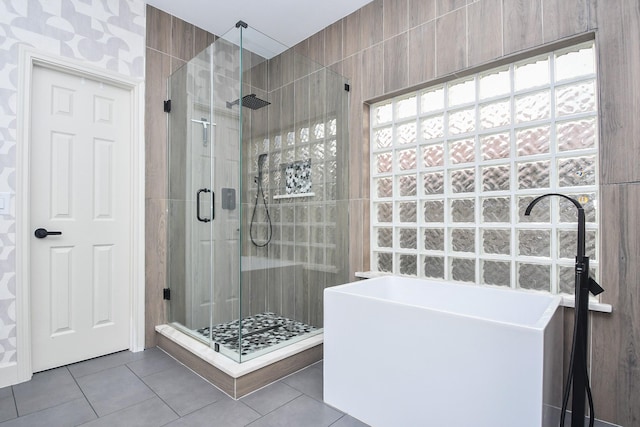 23210 Greenrush Dr, Katy, TX 77494 - bathroom with tile patterned floors, a stall shower, and a bath