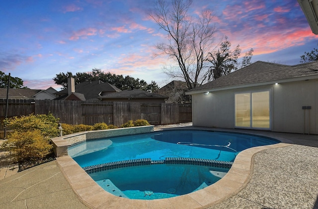 23210 Greenrush Dr, Katy, TX 77494 - view of swimming pool featuring a fenced backyard and a pool with connected hot tub