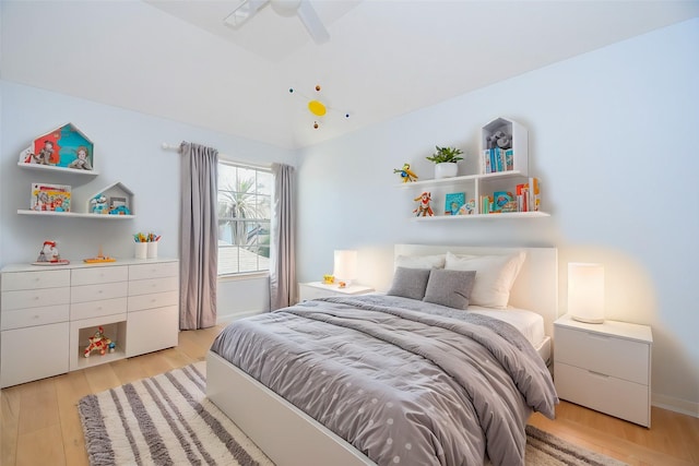23210 Greenrush Dr, Katy, TX 77494 - bedroom with light wood finished floors, lofted ceiling, and a ceiling fan