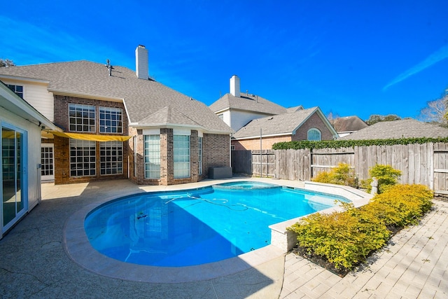 23210 Greenrush Dr, Katy, TX 77494 - view of pool with an in-ground hot tub, a fenced backyard, and a patio area