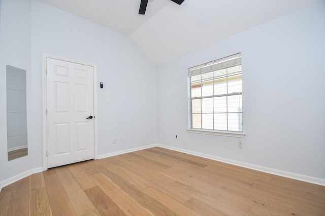 23210 Greenrush Dr, Katy, TX 77494 - spare room with ceiling fan, light wood-style flooring, vaulted ceiling, and baseboards