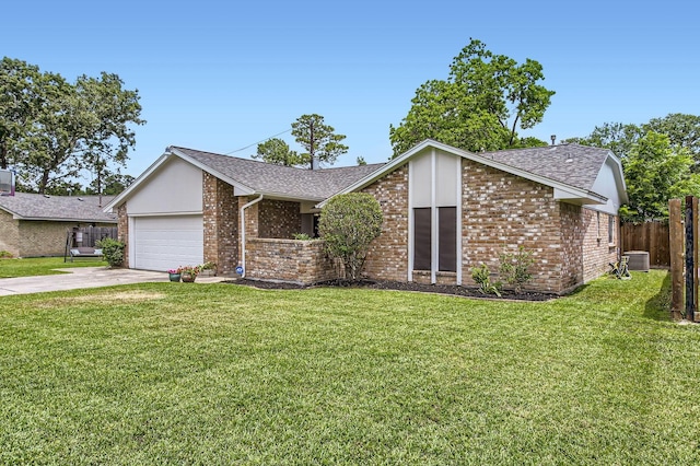 24610 Long Trail Ln, Houston, TX 77336 - mid-century inspired home with brick siding, a garage, concrete driveway, central AC, and roof with shingles