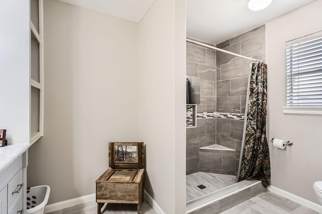 24610 Long Trail Ln, Houston, TX 77336 - bathroom with a stall shower, toilet, and baseboards