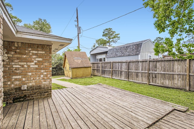 24610 Long Trail Ln, Houston, TX 77336 - wooden deck featuring a storage shed and an outbuilding
