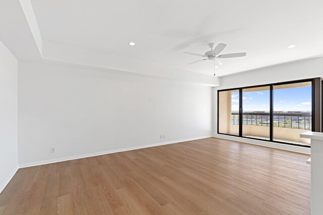 2001 Holcombe Blvd Unit 1605, Houston, TX 77030 - unfurnished room featuring wood finished floors, a ceiling fan, baseboards, and recessed lighting