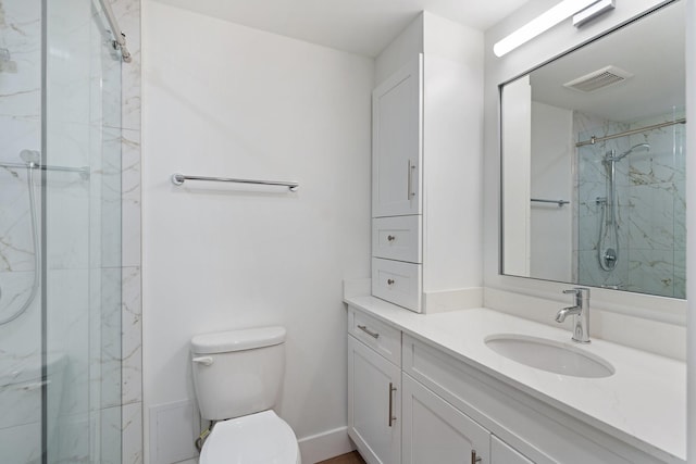 2001 Holcombe Blvd Unit 1605, Houston, TX 77030 - full bathroom featuring toilet, a marble finish shower, and vanity
