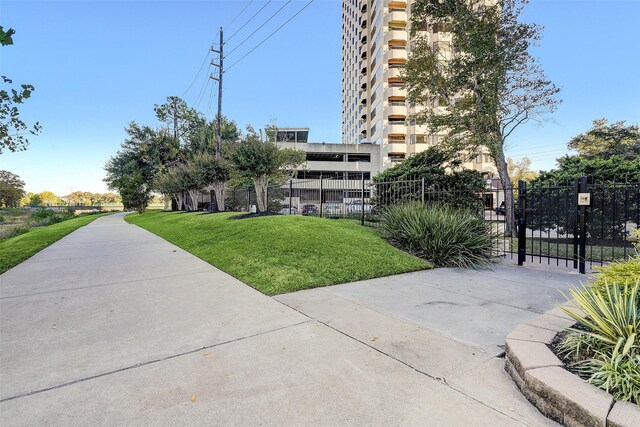2001 Holcombe Blvd Unit 1605, Houston, TX 77030 - view of building exterior featuring fence