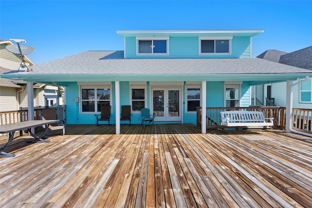 1815 Tiki Dr, Tiki Island, TX 77554 - deck featuring french doors