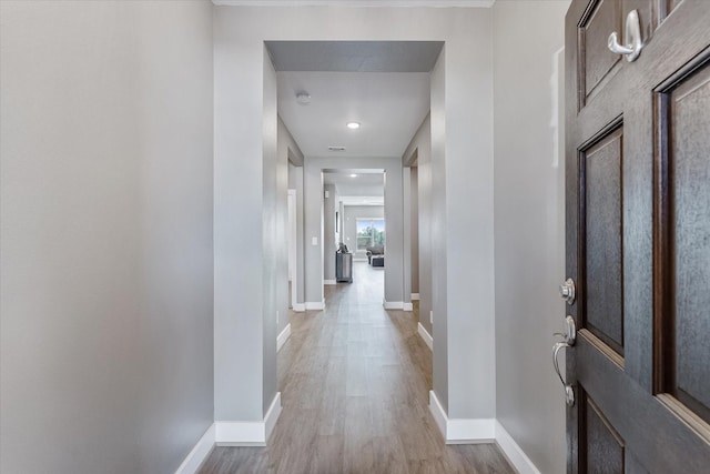 770 Dogberry Ct, Conroe, TX 77304 - corridor featuring baseboards, light wood-style floors, and recessed lighting