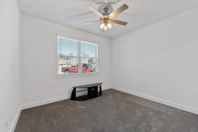 770 Dogberry Ct, Conroe, TX 77304 - empty room featuring dark carpet, baseboards, ceiling fan, and a smoke detector
