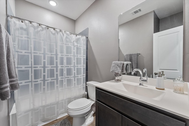 770 Dogberry Ct, Conroe, TX 77304 - full bathroom featuring toilet, vanity, shower / tub combo with curtain, and wood finished floors