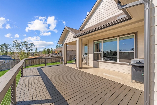 770 Dogberry Ct, Conroe, TX 77304 - deck featuring area for grilling, a fenced backyard, and a patio area
