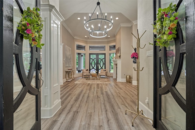 15471 Castlebrook Ct, Montgomery, TX 77316 - entrance foyer with ornamental molding, recessed lighting, a chandelier, light wood-type flooring, and baseboards