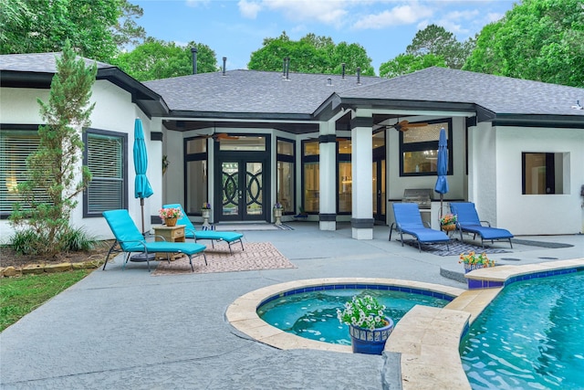 15471 Castlebrook Ct, Montgomery, TX 77316 - back of house with french doors, a patio, a jacuzzi, roof with shingles, and an outdoor pool