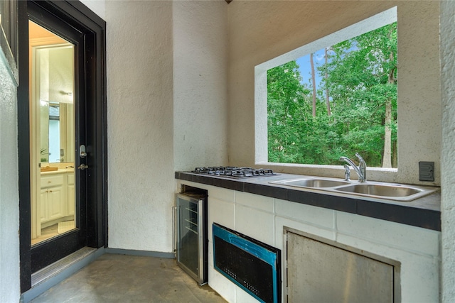 15471 Castlebrook Ct, Montgomery, TX 77316 - view of patio / terrace featuring wine cooler and a sink