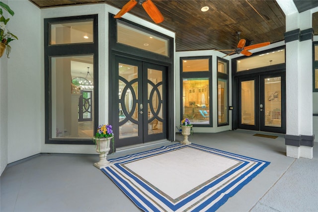15471 Castlebrook Ct, Montgomery, TX 77316 - doorway to property with french doors, a ceiling fan, and stucco siding