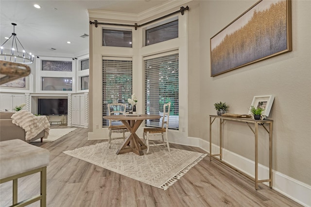 15471 Castlebrook Ct, Montgomery, TX 77316 - dining space with crown molding, wood finished floors, a chandelier, and recessed lighting