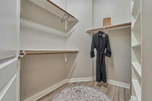 15471 Castlebrook Ct, Montgomery, TX 77316 - spacious closet featuring wood finished floors