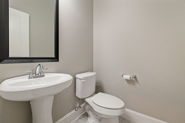 2037 Capriccio Dr, Spring, TX 77386 - half bathroom with baseboards and toilet