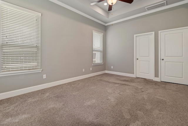 2037 Capriccio Dr, Spring, TX 77386 - unfurnished room with a ceiling fan, carpet floors, baseboards, ornamental molding, and a tray ceiling