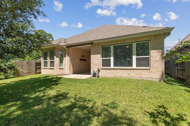 2037 Capriccio Dr, Spring, TX 77386 - rear view of house with brick siding, a patio, and roof with shingles