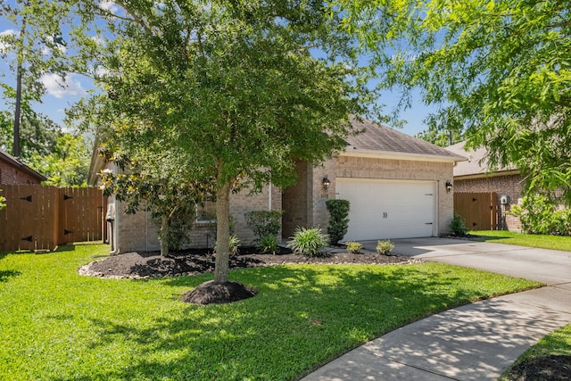 2037 Capriccio Dr, Spring, TX 77386 - view of front facade featuring driveway, brick siding, a garage, roof with shingles, and a gate