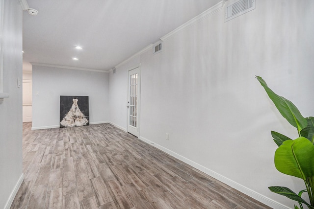 8245 Kingsbrook Rd Unit 139, Houston, TX 77024 - unfurnished living room featuring ornamental molding, wood finished floors, baseboards, and recessed lighting