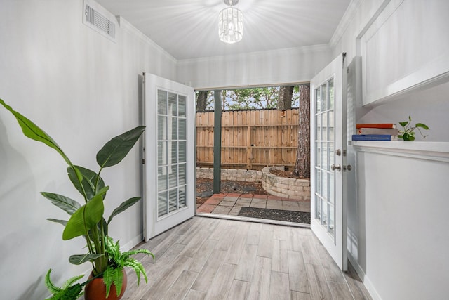 8245 Kingsbrook Rd Unit 139, Houston, TX 77024 - unfurnished sunroom with french doors and a chandelier