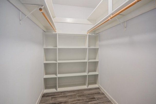 8245 Kingsbrook Rd Unit 139, Houston, TX 77024 - spacious closet featuring dark wood finished floors