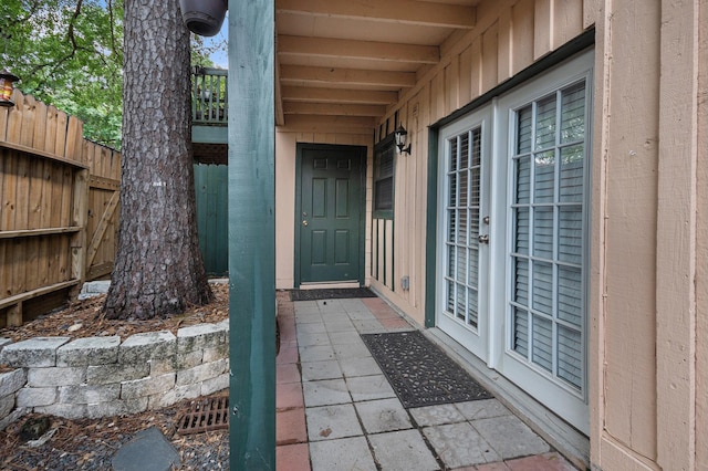 8245 Kingsbrook Rd Unit 139, Houston, TX 77024 - doorway to property featuring board and batten siding