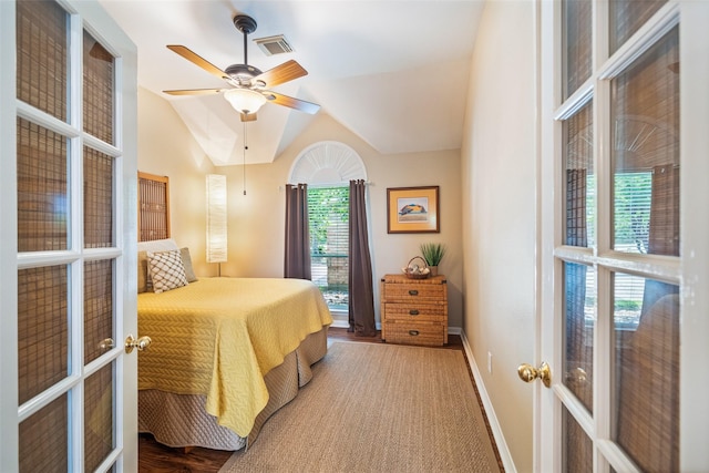 bedroom with french doors, baseboards, lofted ceiling, and a ceiling fan