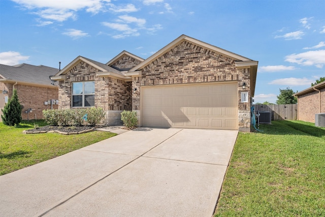 11355 Dawn Beach Ln, Conroe, TX 77304 - view of front of home with a garage, driveway, and brick siding