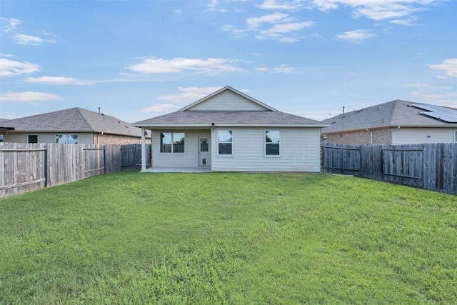 11355 Dawn Beach Ln, Conroe, TX 77304 - rear view of house featuring a patio area and roof with shingles
