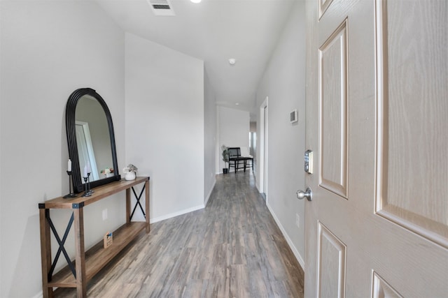 11355 Dawn Beach Ln, Conroe, TX 77304 - entryway featuring wood finished floors and baseboards